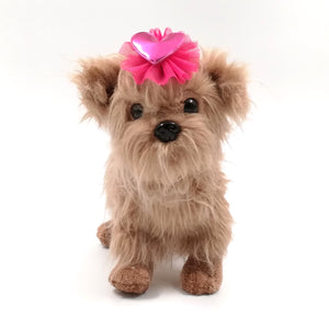 Cute dog wearing dark pink tutu hair accessory